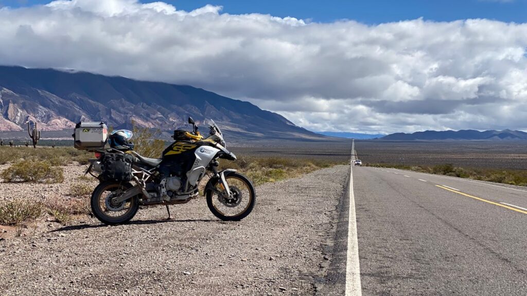 Explore Salta, Argentina on a motorcycle with dramatic mountain views and endless roads.